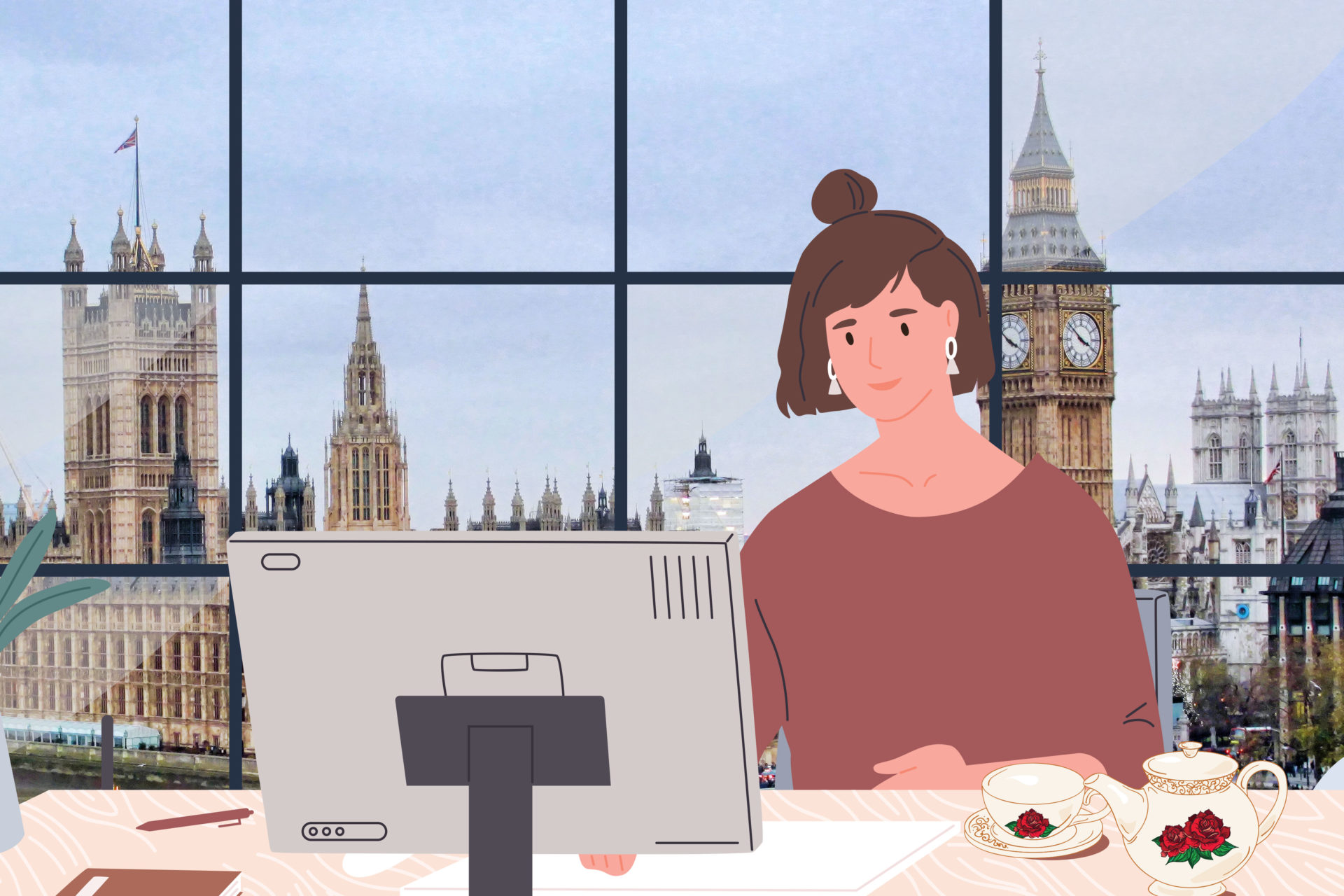 A person sitting at a computer at a desk. Behind her is a big window with a view of Big Ben and there is a pot of tea on her desk.