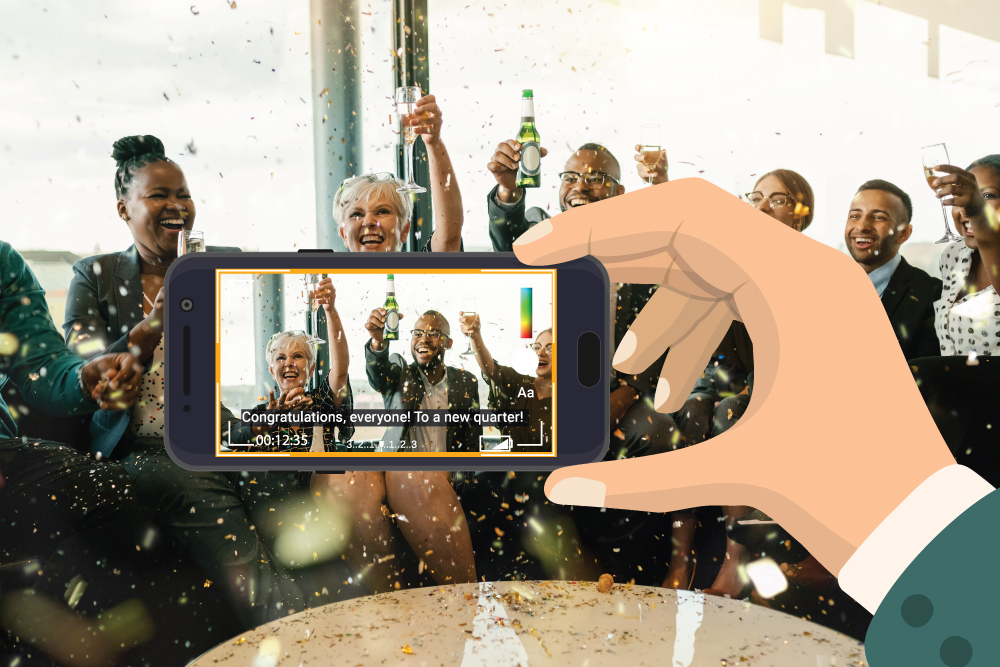 People drinking champagne and celebrating. A person holds a mobile phone and records a captioned video on social media.